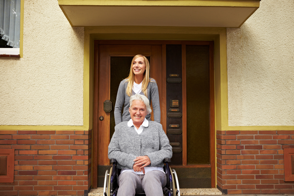 Smiling woman making the most of her assisted living tour